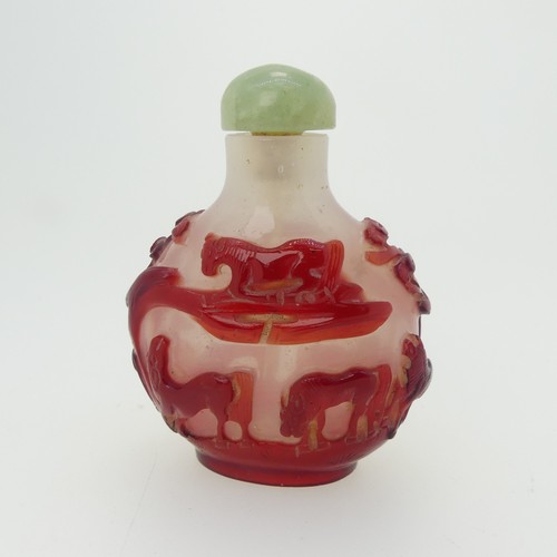 93 - A Chinese overlayed glass Snuff Bottle, with yellow ground, overlayed in red and white depicting bir... 