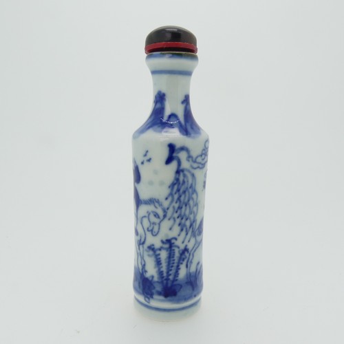 96 - A Chinese famille rose porcelain Snuff Bottle, the white ground decorated with enamels of a grasshop... 