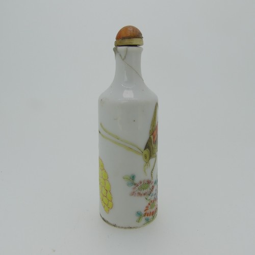 96 - A Chinese famille rose porcelain Snuff Bottle, the white ground decorated with enamels of a grasshop... 