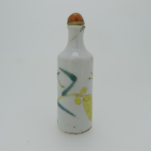 96 - A Chinese famille rose porcelain Snuff Bottle, the white ground decorated with enamels of a grasshop... 