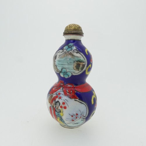 97 - A Chinese cloissone enamel joint double gourd Snuff Bottle, with stoppers, enamelled with scenes of ... 