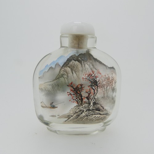 100 - A Chinese glass Snuff Bottle, of yellow ground painted with floral enamels, red stone stopper, three... 