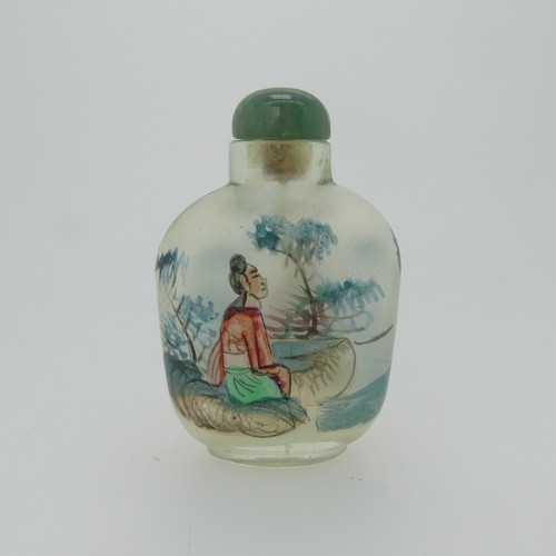 100 - A Chinese glass Snuff Bottle, of yellow ground painted with floral enamels, red stone stopper, three... 