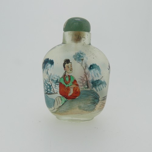 100 - A Chinese glass Snuff Bottle, of yellow ground painted with floral enamels, red stone stopper, three... 