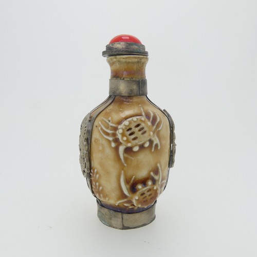 101 - A Chinese porcelain Snuff Bottle, depicting iron red Dragons on green ground, character mark to base... 