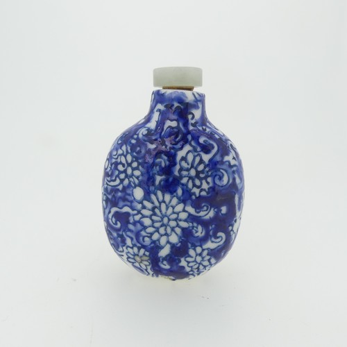 101 - A Chinese porcelain Snuff Bottle, depicting iron red Dragons on green ground, character mark to base... 