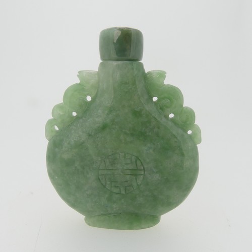 102 - A small quantity of Chinese jade Snuff Bottles, comprising one carved with bats, hardstone stopper, ... 