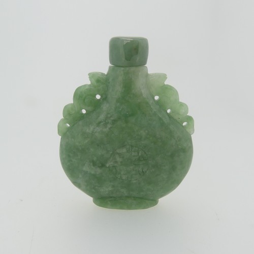 102 - A small quantity of Chinese jade Snuff Bottles, comprising one carved with bats, hardstone stopper, ... 