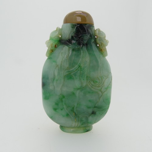 102 - A small quantity of Chinese jade Snuff Bottles, comprising one carved with bats, hardstone stopper, ... 