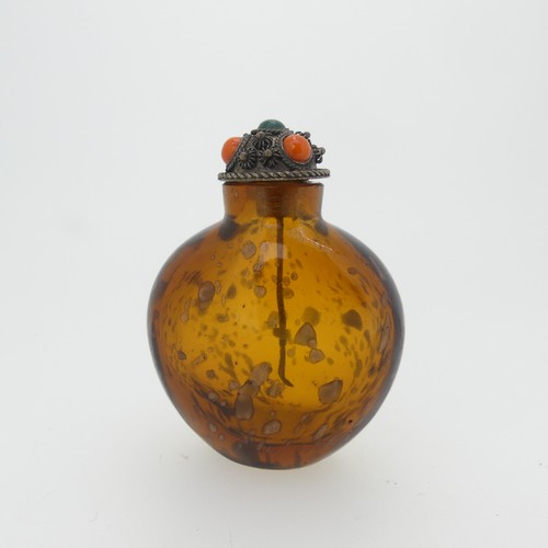 109 - A Chinese 'Luohan' carved walnut shell Snuff Bottle, depicting faces, with metal and stone stopper, ... 