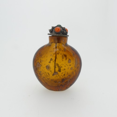 109 - A Chinese 'Luohan' carved walnut shell Snuff Bottle, depicting faces, with metal and stone stopper, ... 