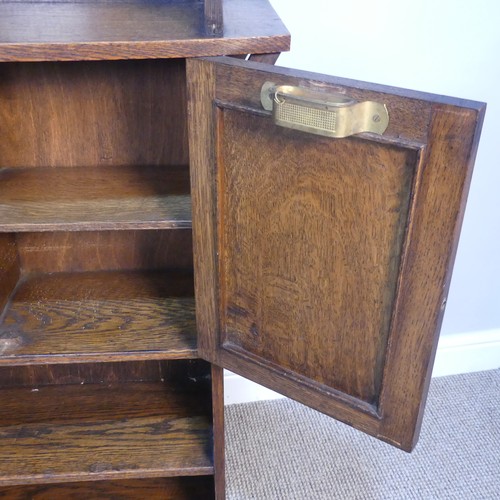 406 - An Arts and Crafts oak Bookcase with cupboard, in the manner of Liberty, W 67 cm x H 104 cm x D 25 c... 