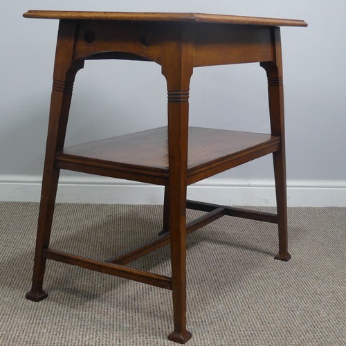 407 - An Arts and Crafts oak side Table, in the manner of Liberty, with fake drawer raised on reeded suppo... 