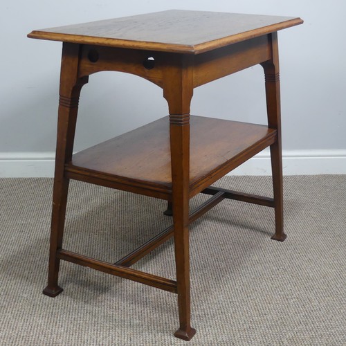 407 - An Arts and Crafts oak side Table, in the manner of Liberty, with fake drawer raised on reeded suppo... 