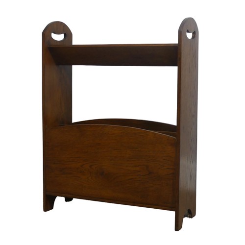 410 - An Arts and Crafts oak magazine Stand with book rest to top, In the manner of Liberty with pierced s... 