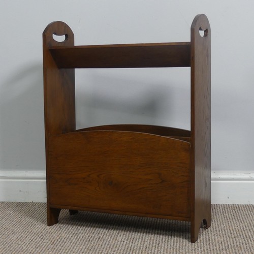 410 - An Arts and Crafts oak magazine Stand with book rest to top, In the manner of Liberty with pierced s... 