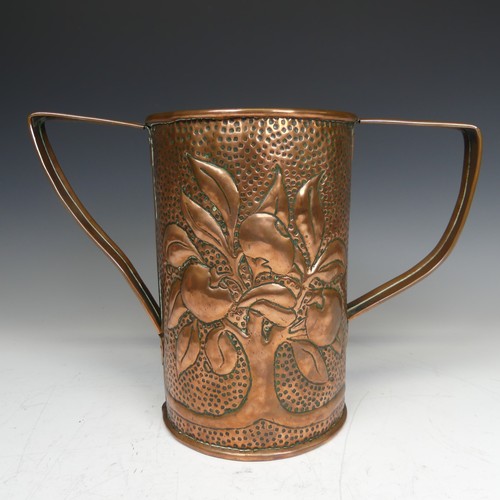 412 - An Arts and Crafts copper twin handled Vase, probably by John williams, decorated with stylised frui... 