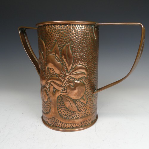 412 - An Arts and Crafts copper twin handled Vase, probably by John williams, decorated with stylised frui... 