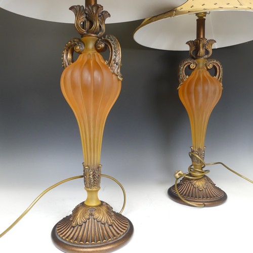 419 - A pair of Antique frosted amber resin and gilt wood table Lamps, H 76 cm.