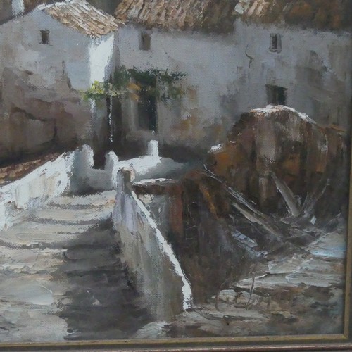 169 - Manuel Cuberos (b. 1933), View of a Spanish village, oil on canvas, signed, 54cm 45cm, framed.... 