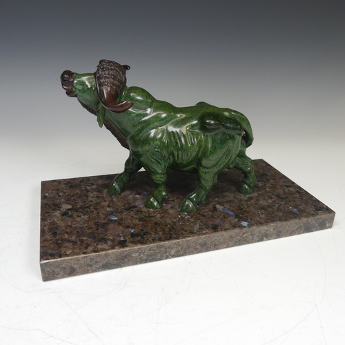 123 - A decorative carved green soapstone Buffalo, mounted on Labrador antique granite base, W:30cm x D:15... 