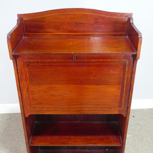 439 - An Edwardian mahogany slim upright Desk / Bureau bookcase, the fall front with appointed interior an... 