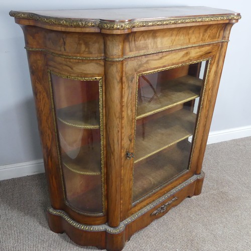 444 - A Victorian gilt metal mounted walnut Credenza, central glass door with gilt metal surround, flanked... 