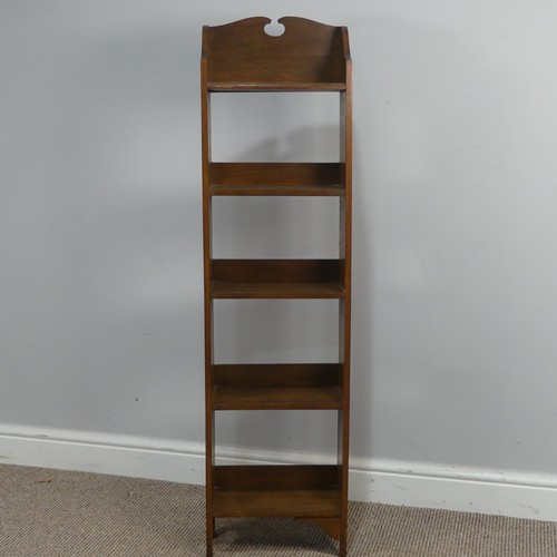 447 - An Arts and Crafts thin oak open Bookcase, W 30.5 cm x H 117 cm x D 15.5 cm.