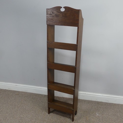 447 - An Arts and Crafts thin oak open Bookcase, W 30.5 cm x H 117 cm x D 15.5 cm.