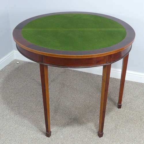 452 - An Edwardian mahogany demi-lune fold-over card Table, chequer inlaid top raised on tapering legs and... 