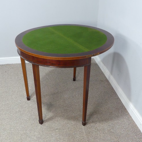 452 - An Edwardian mahogany demi-lune fold-over card Table, chequer inlaid top raised on tapering legs and... 