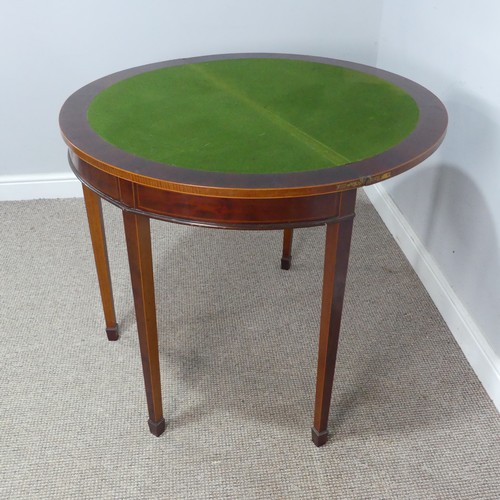 452 - An Edwardian mahogany demi-lune fold-over card Table, chequer inlaid top raised on tapering legs and... 