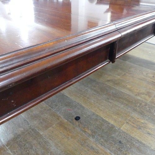 457 - A Victorian mahogany extending Dining Table, raised on bulbous carved legs upon ceramic castors, W 2... 