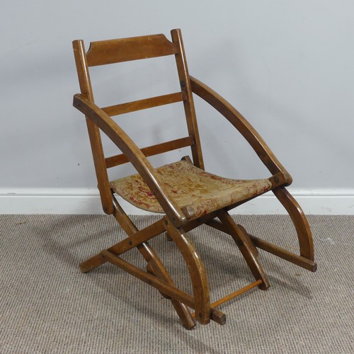 464 - An early 20th century mahogany folding campaign Chair, with tapestry seat, W 49cm x H 80cm x D 73cm... 