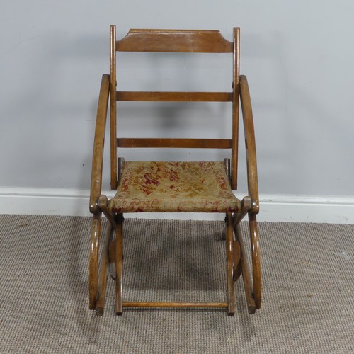 464 - An early 20th century mahogany folding campaign Chair, with tapestry seat, W 49cm x H 80cm x D 73cm... 