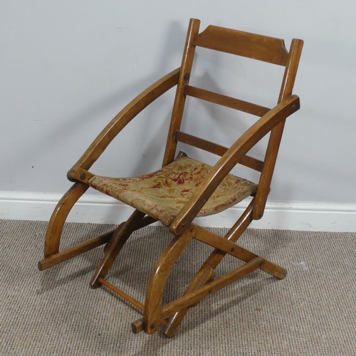 464 - An early 20th century mahogany folding campaign Chair, with tapestry seat, W 49cm x H 80cm x D 73cm... 