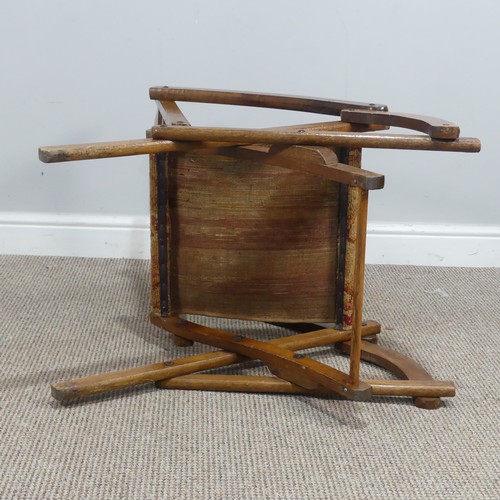 464 - An early 20th century mahogany folding campaign Chair, with tapestry seat, W 49cm x H 80cm x D 73cm... 