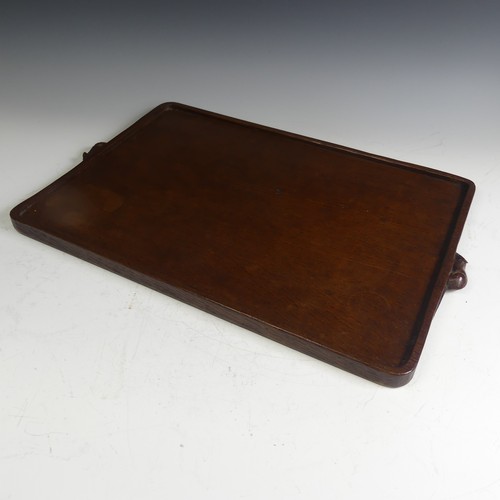 471 - Robert 'Mouseman' Thompson of Kilburn: An English oak Tea Tray, of rectangular form with raised side... 