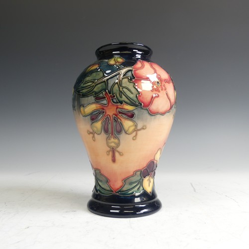 61 - A Moorcroft pottery 'Oberon' pattern Vase, of baluster form, typical tube lined decoration, factory ... 