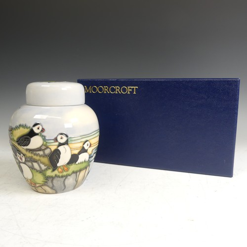 63 - A Moorcroft pottery 'Puffins' pattern Ginger Jar, tube lined decoration of puffins amongst seascape,... 