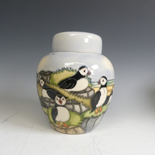 63 - A Moorcroft pottery 'Puffins' pattern Ginger Jar, tube lined decoration of puffins amongst seascape,... 