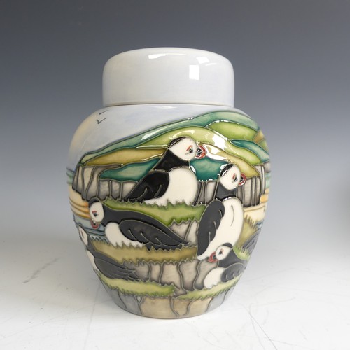 63 - A Moorcroft pottery 'Puffins' pattern Ginger Jar, tube lined decoration of puffins amongst seascape,... 