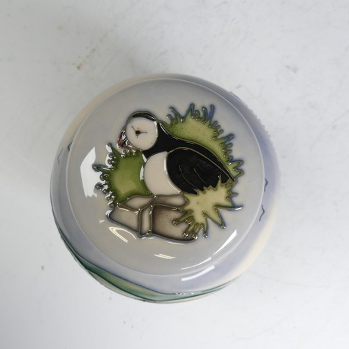 63 - A Moorcroft pottery 'Puffins' pattern Ginger Jar, tube lined decoration of puffins amongst seascape,... 