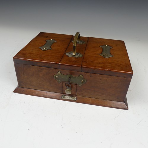 472 - An Early 20th century Arts and Crafts oak metal bound smokers Box, with central carry handle and twi... 