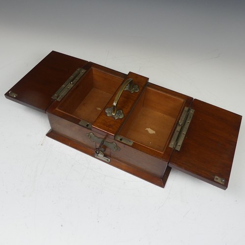 472 - An Early 20th century Arts and Crafts oak metal bound smokers Box, with central carry handle and twi... 