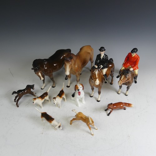 69 - A Beswick pottery Hunt, comprising a red coat rider, a black coat rider, two foals, three hounds, a ... 