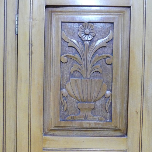 484 - An Edwardian satinwood single Wardrobe, flared and moulded cornice over mirror, flanked by carved fl... 