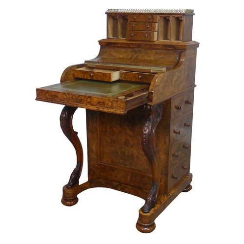 504 - A Victorian burr walnut piano top Davenport Desk, the rectangular top with pierced brass three-quart... 