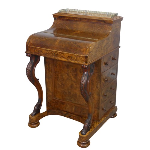 504 - A Victorian burr walnut piano top Davenport Desk, the rectangular top with pierced brass three-quart... 