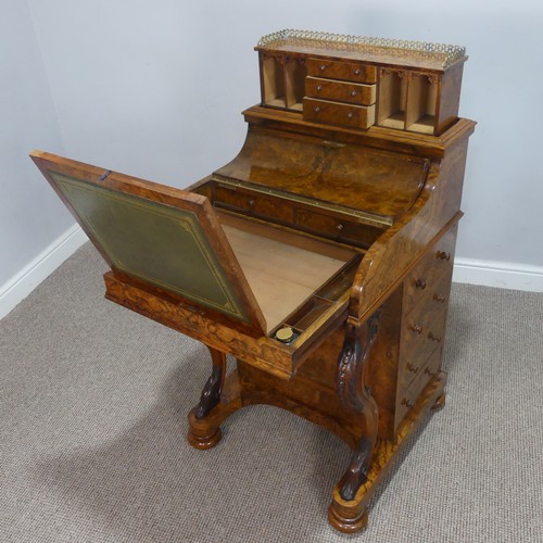 504 - A Victorian burr walnut piano top Davenport Desk, the rectangular top with pierced brass three-quart... 